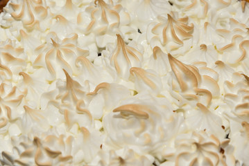 fresh meringue cake on the wooden table meringue