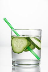 Cucumber water, cleansing water to detoxify the body and quench thirst on a white background.