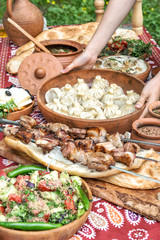 Georgian food Caucasian shashlik khinkali salad Dinner table