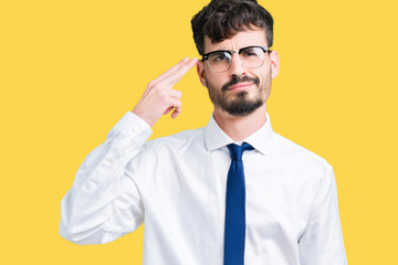 Young handsome business man wearing glasses over isolated background Shooting and killing oneself pointing hand and fingers to head, suicide gesture.