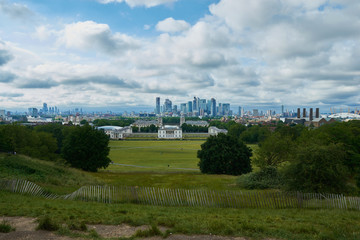 LONDON, ENGLAND/UNITES KINGDOM –– JUNE 11 2019: View of London from Greenwich park at cloudy summer day