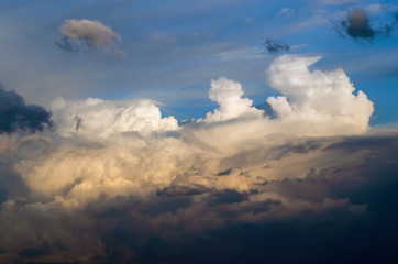 Beautiful stormy cumulus clouds in the sky, background.