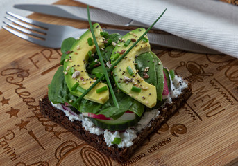 Fresh  vegetarian sandwich with greens and avocado