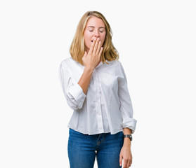 Beautiful young business woman over isolated background bored yawning tired covering mouth with hand. Restless and sleepiness.