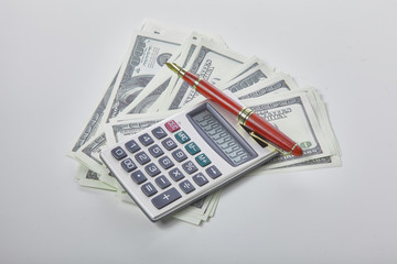 Calculator on money banknote, finance and savings.