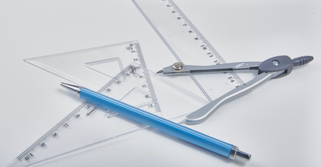 extremely selective focus a part of the silver pencil and precision measurement tool , concept of construction or building design drawing idea.