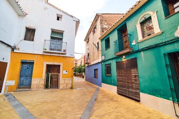 Fototapeta na wymiar DENIA, SPAIN - JUNE 13, 2019: Old town of Denia with narrow streets and pavement