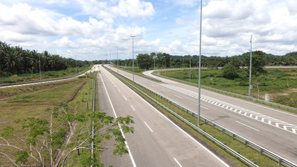 Empty highway without cars near Kuala Terengganu in Malaysia, Southeast Asia.