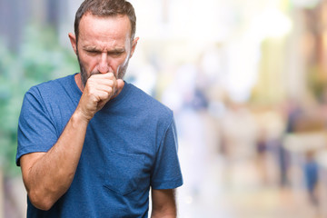 Middle age hoary senior man over isolated background feeling unwell and coughing as symptom for...