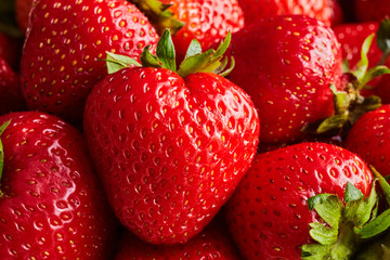 Several close-up strawberries. Fresh and juice