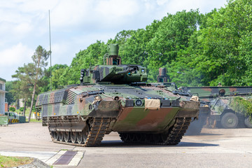 German infantry fighting vehicle drives on a street