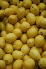 Fresh yellow lemon citrus fruit background, close-up, Vitamin food