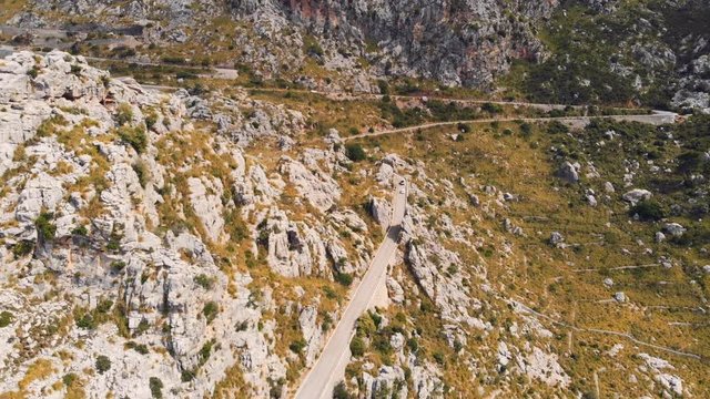 aerial drone mountain landscape empty rural road Serra de Tramuntana Nudo de Corbata Sa Calobra Mallorca Spain