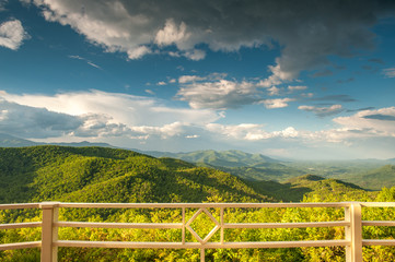 Stunning view of the north mountains from Black Mountain, NC, USA showing the porch railing.
