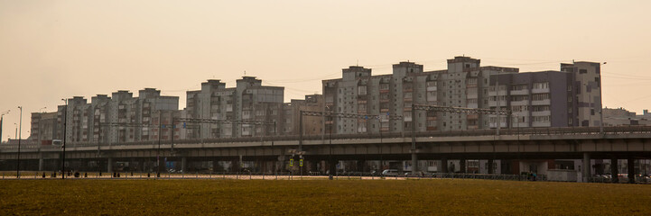Fototapeta na wymiar panoramic view of apartment buildings during sunset
