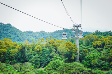 Maokong gondola with mountain around. A gondola lift transportation system in Taipei opened in 2007. operates between Taipei Zoo and Maokong. © TeTe Song