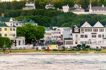 Passing by downtown Mackinac Island  at sunset from a ferry on Lake Michigan