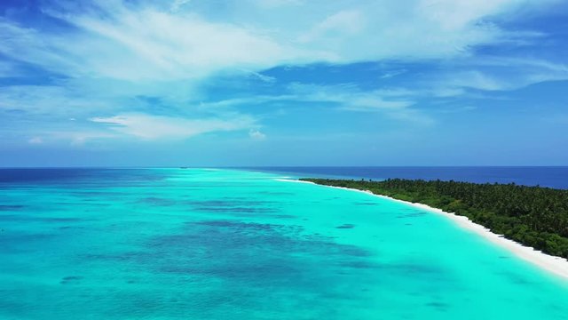 astonishing view exotic island beach in Thailand under the bright sky wit white clouds, ,coral reef and beautiful crystal clear water, aerial drone shot