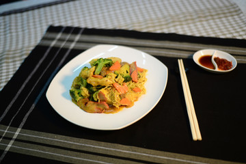 Chinese curry fried noodle, setup nicely on a table ready to serve