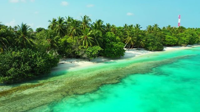 aerial drone dolly in establishing shot of turquoise water and beaches in Thailand. Ko Kradan in the Ko Lanta National Park, preserved flora i founa of island