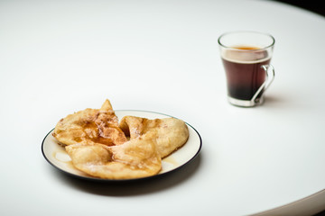 Sopapilla desserts with a cup of coffee