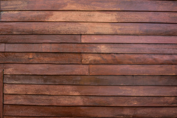 Obraz premium Old red wooden plank fence background texture, Scratched wooden texture background surface with natural pattern-Image