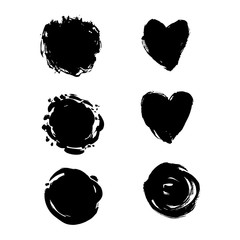 Black ink round shapes and heart shapes isolated on white background.