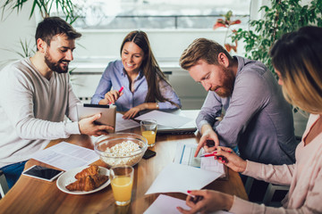 Successful start-up team in training. Business team working on marketing strategy.  Brainstorming meeting concept.