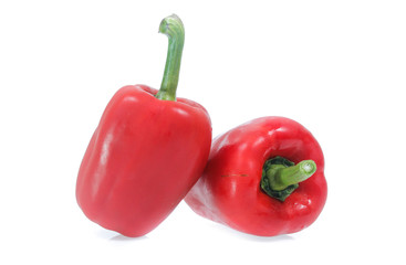 peppers with white background. Cut in half with slices