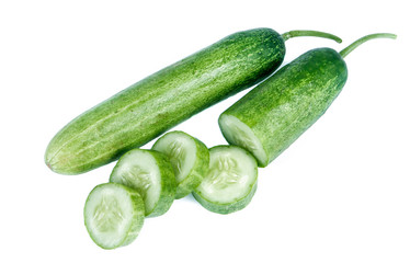 Cucumber and slices isolated over white background