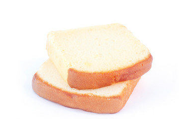 Sliced butter cake isolated on white background.