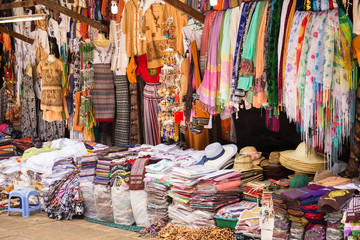 Beautiful traditional handmade clothes for sale to the tourist as the souvenir at the local market...