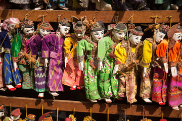 Traditional handicraft puppets are sold in a market in Bagan, Myanmar