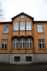 Fototapeta na wymiar Facade of a typical residential building in Tallinn, Estonia
