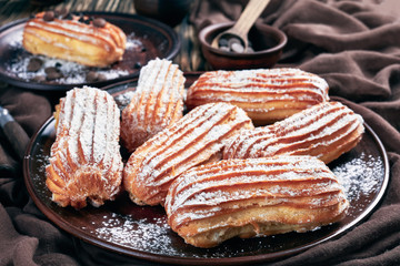 close-up of delicious Homemade Eclairs on a plate
