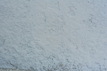 Texture, wall, concrete, it can be used as a background. Wall fragment with scratches and cracks