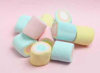 colorful marshmallows candy  on pink background