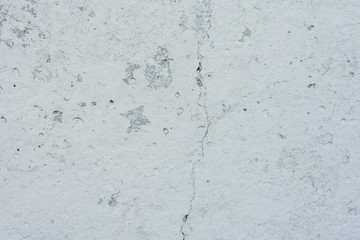 Texture, wall, concrete, it can be used as a background. Wall fragment with scratches and cracks