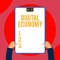 Text sign showing Digital Economy. Business photo text worldwide network of economic activities and technologies Two executive male hands holding electronic device geometrical background