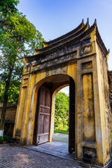 Fototapeta premium Small Old Gate of the Thang Long Citadel in the imperial city, Hanoi, Vietnam.