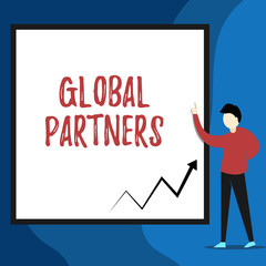 Word writing text Global Partners. Business photo showcasing Two or more firms from different countries work as a team View young man standing pointing up blank rectangle Geometric background