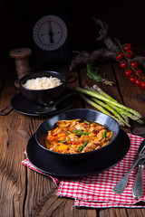 colorful turkey fricassee with asparagus and paprika