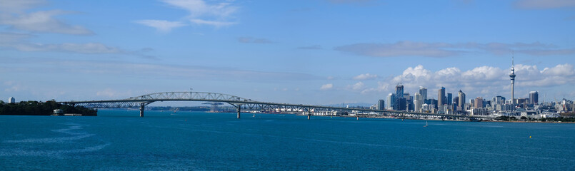 Panoramic view of the Auckland Harbour Bridge, with Auckland City as background
