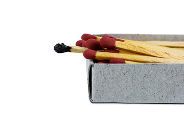 burnt match on open box matches isolated on white background