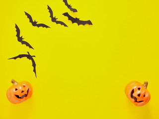 Halloween decoration on yellow background