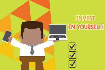 Conceptual hand writing showing Invest In Yourself. Concept meaning nvesting in a coach or a training to learn new things Professional man holding laptop in left mobile phone right