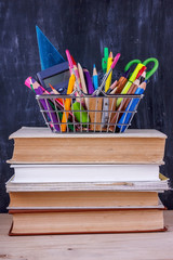 Set of colored pencils and markers for school. Stationery for the student - scissors, sharpener,...