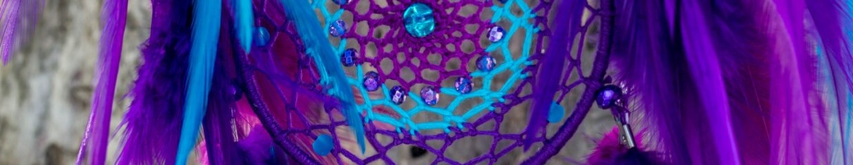Banner of Handmade dream catcher with feathers threads and beads rope hanging