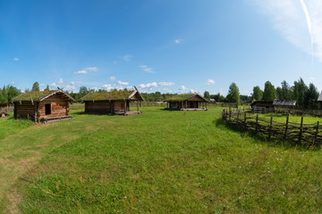 Fototapeta na wymiar Residential houses of the Slavic village of the tenth century