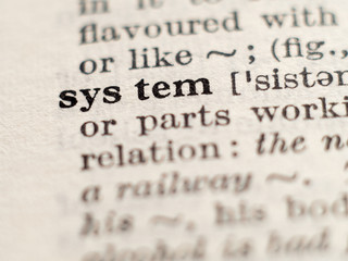 Dictionary definition of word system, selective focus.